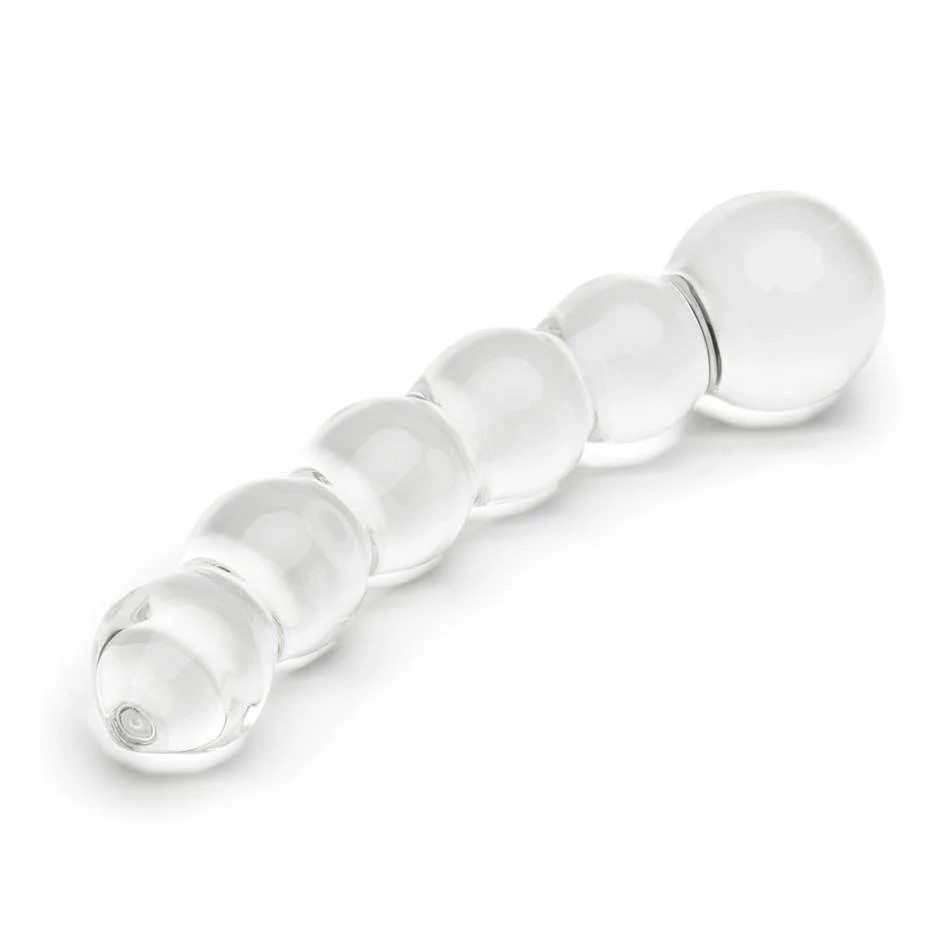 Behold the translucent beauty of this glass dildo, designed to tantalize and satisfy.